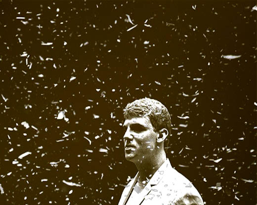 Portrait in falling confetti