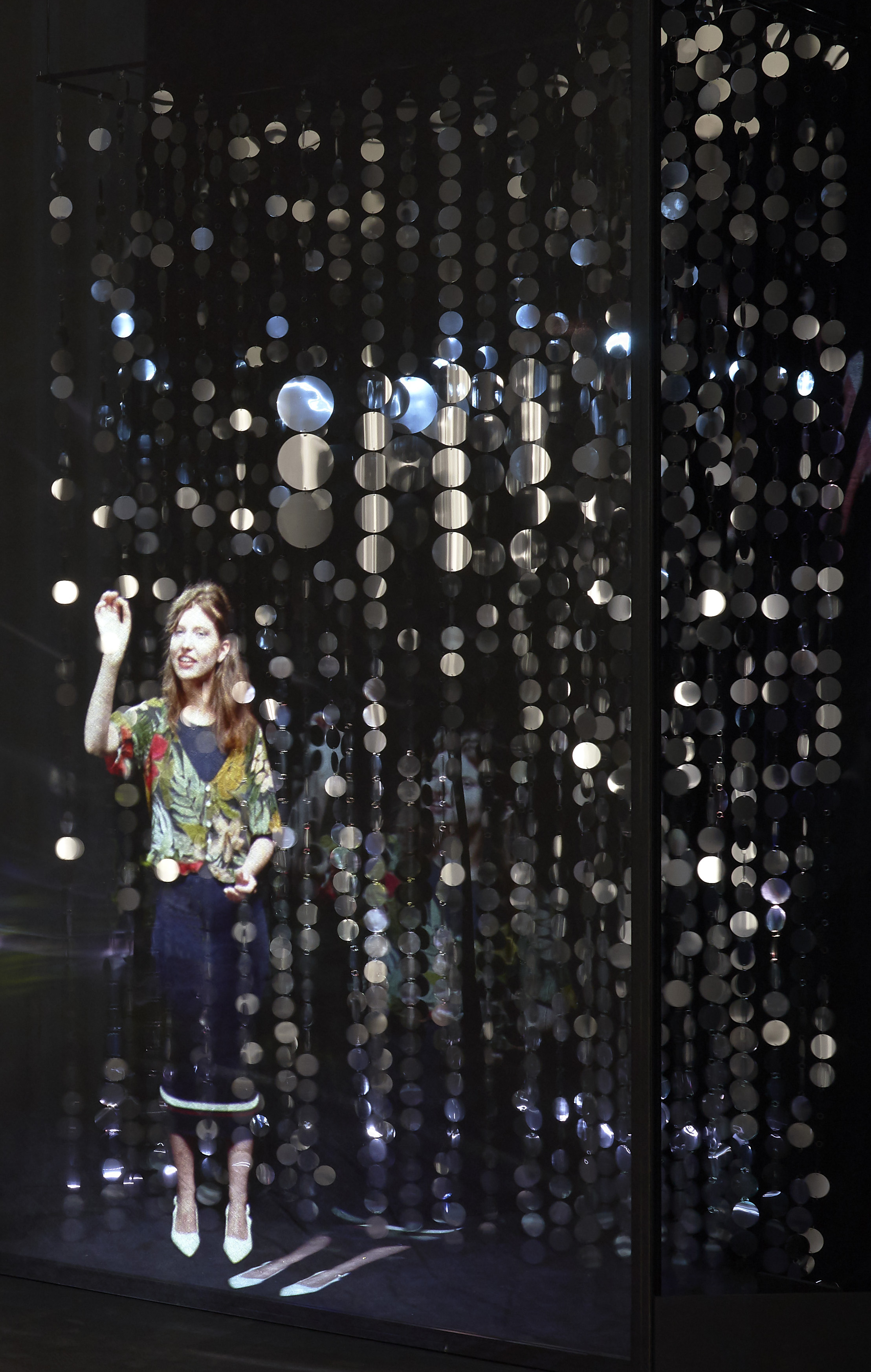 Sequin curtain with figure (installation view)